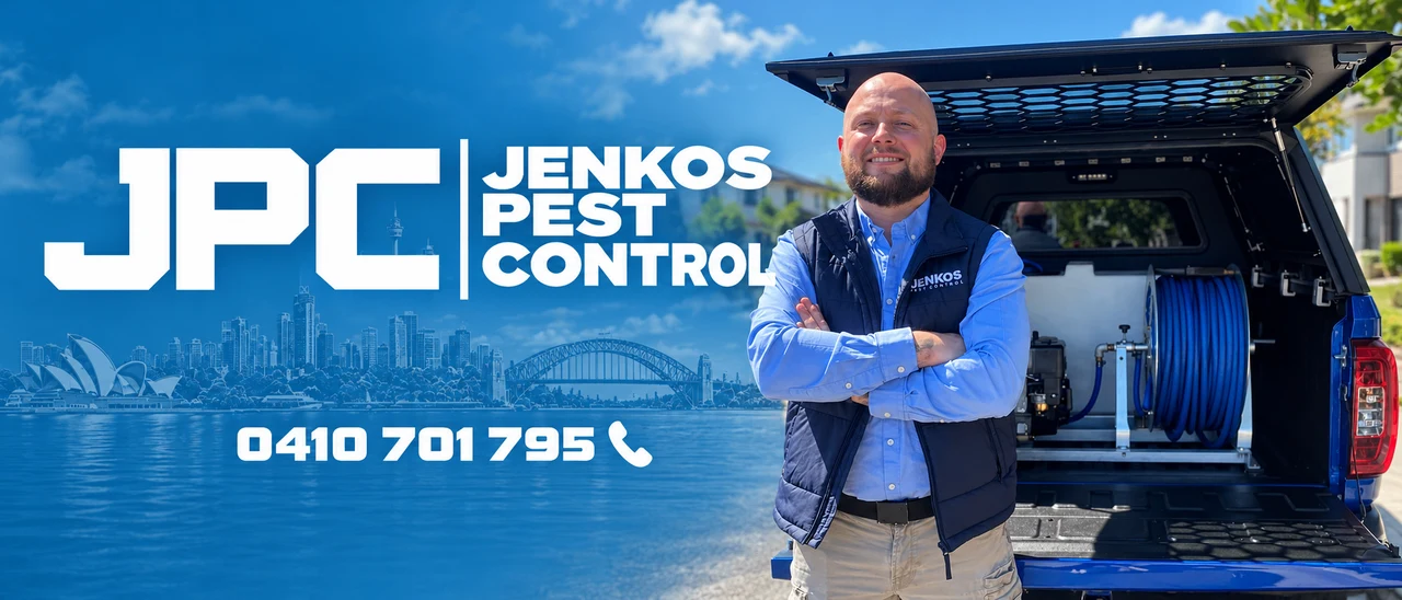 Jenkos Pest Control — Blake, owner, beside his equipped service ute with the Sydney skyline and phone number 0410 701 795